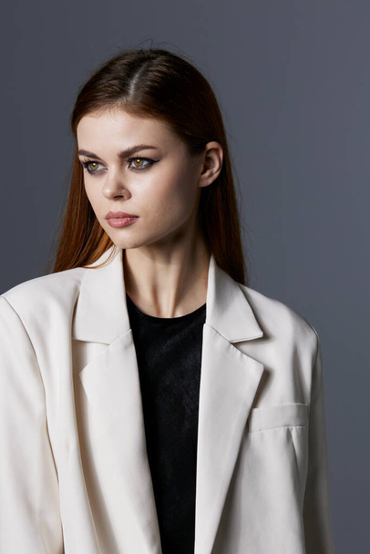 beautiful woman model in white coat isolated background - Fotografie, Obrázek