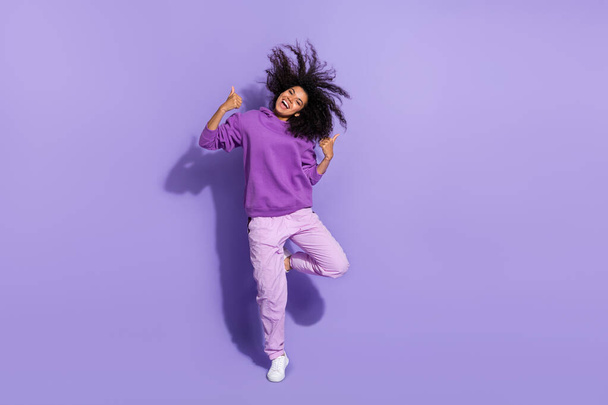 Full length photo of excited crazy pretty lady two hands show thumb up flying curly hairdo isolated on purple color background - Valokuva, kuva
