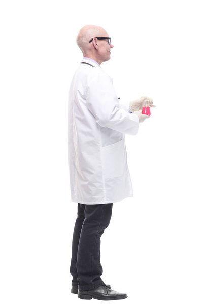 competent doctor with a laboratory flask. isolated on a white - Foto, afbeelding