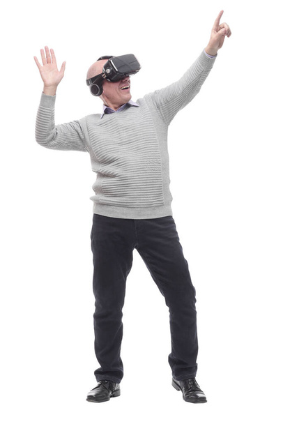 in full growth. smiling man in virtual reality glasses. - Φωτογραφία, εικόνα