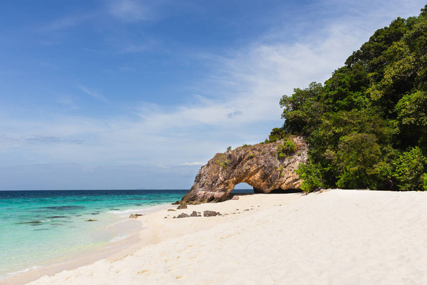 Natural stone arch and white beach at Ko Khai near Tarutao national park Satun Thailand. - Zdjęcie, obraz