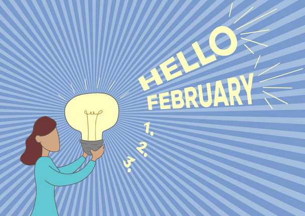 Text caption presenting Hello February. Internet Concept greeting used when welcoming the second month of the year Lady Standing Drawing Holding Light Up Showing New Ideas. - Photo, Image