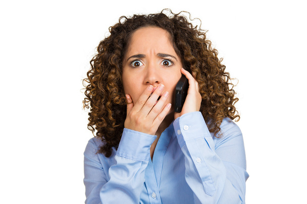 Worried brunette woman talking on phone - Fotografie, Obrázek