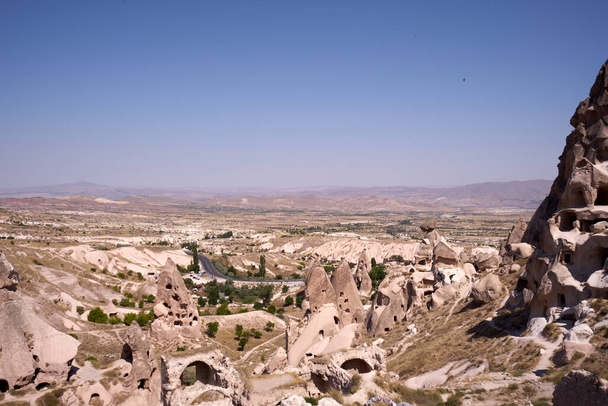 Cappadocia, Anatolia, Turkey.Aerial view of Goreme National Park, Rock formations of Cappadocia with fairy chimneys and desert landscape. Travel destinations, holidays and adventure                                                   - Φωτογραφία, εικόνα