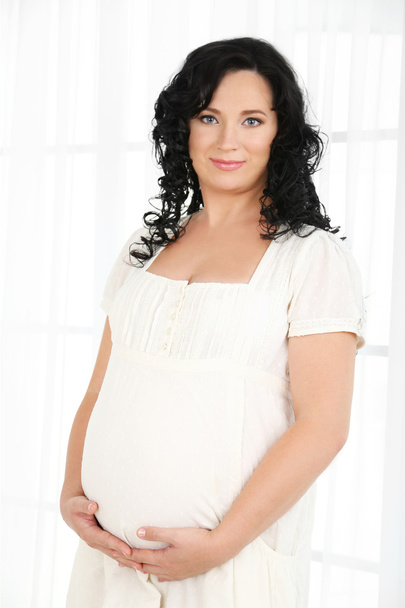 Young pregnant woman - Фото, зображення