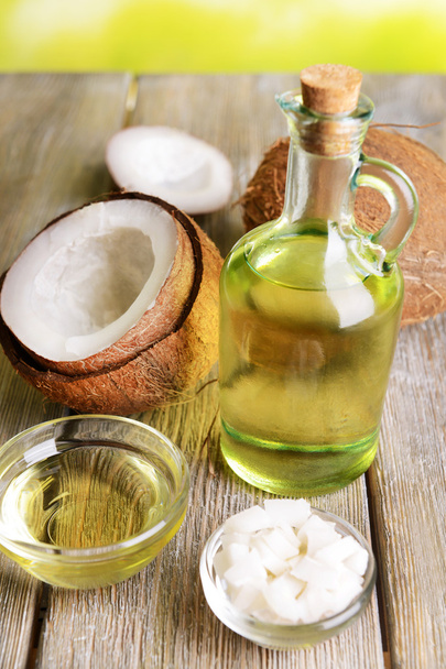 Coconut oil on table close-up - Φωτογραφία, εικόνα