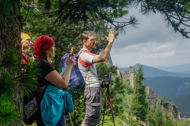 Ergaki, Krasnoyarsk Territory, Russia - July 17, 2020: Hikers in the Sayan Mountains - Фото, изображение