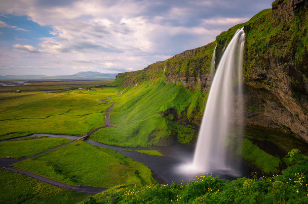 Seljalandsfoss Waterfall on the Seljalands River in Iceland - Photo, Image