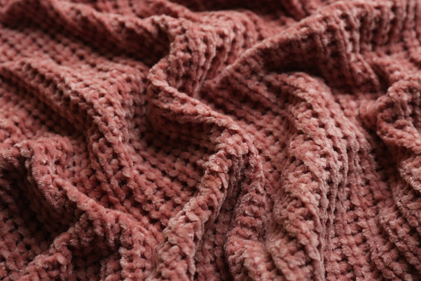 Beautiful pink knitted fabric as background, closeup - Foto, immagini