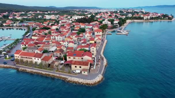 Adriatic village of Bibinje harbor and waterfront panoramic view, Dalmatia region of Croatia. Bibinje village on calm sea, colorful waterfront view, Dalmatia region of Croatia - Imágenes, Vídeo