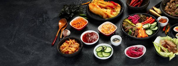 Assortment of Korean traditional dishes. Asian food. panorama - Фото, изображение