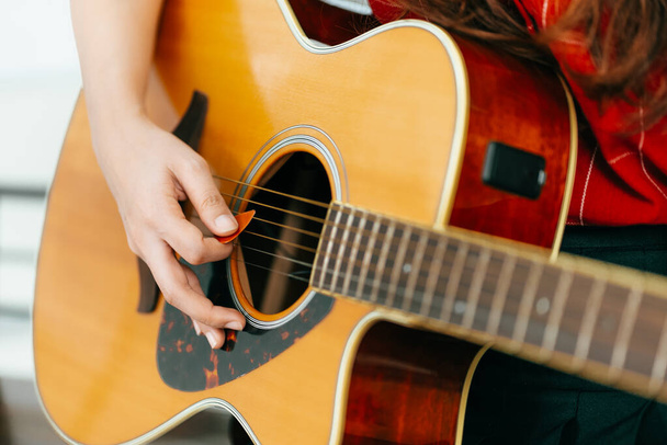 Girl hand playing guitar  - Foto, Imagem