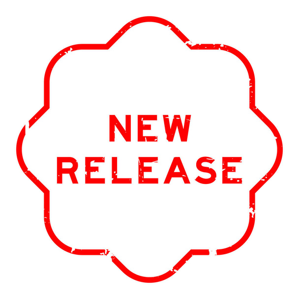 Grunge vermelho novo lançamento palavra selo de borracha no fundo branco - Vetor, Imagem