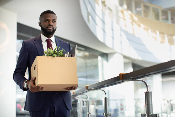 Motivated african american young man in suit with working stuff - Photo, Image