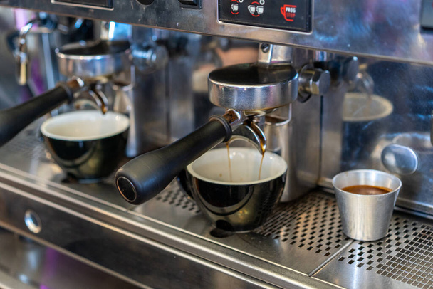 A closeup shot of a coffee making machine - Фото, зображення