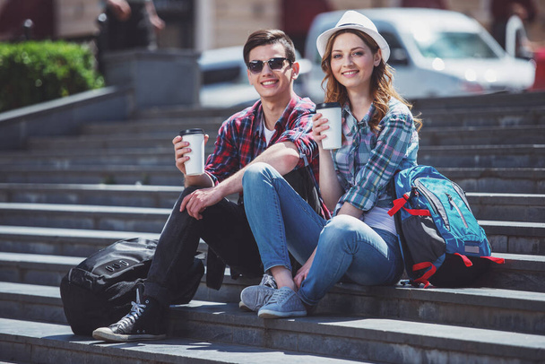 Attractive tourist couple relaxing sightseeing and enjoying traveling together. - 写真・画像