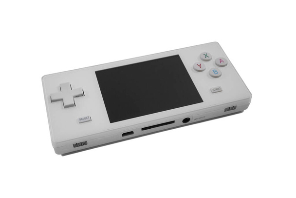 Retro witte handheld spelcomputer geïsoleerd op wit.  - Foto, afbeelding