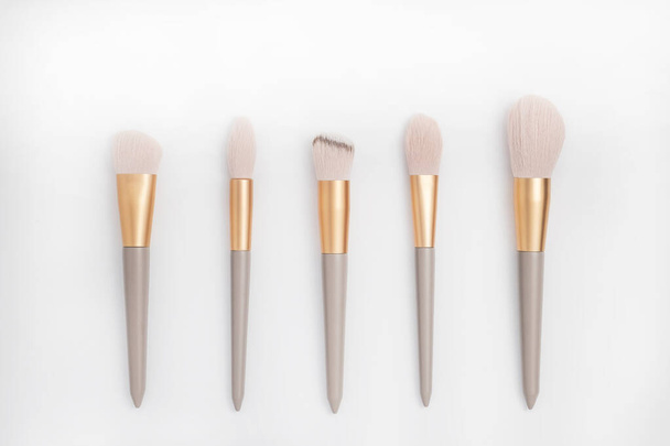 Cosmetic brushes on white background. Set of makeup brushes - Foto, Imagem