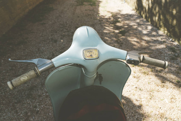 TERNI, ITALY - Jul 27, 2020: Terni, Italy, July 27, 2020: Vespa special 50 vintage Piaggio detail of the handlebar on the driver's side - Photo, image
