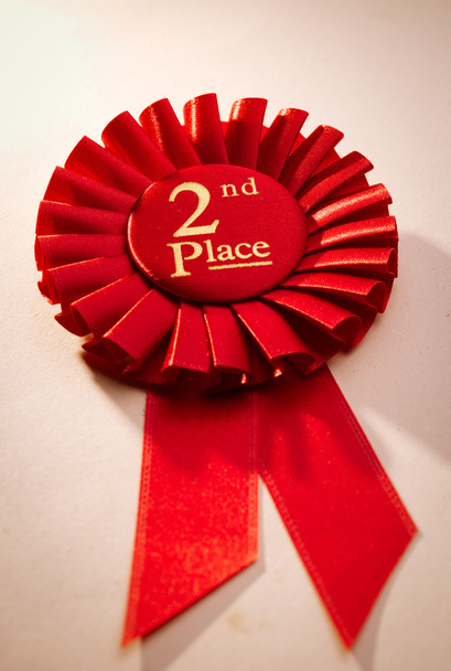 2e place rosette ou badge en rouge
 - Photo, image