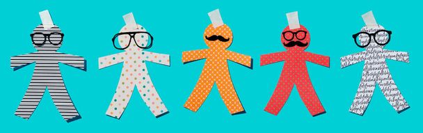 different paper man dolls on a blue background, as a prank for the innocents day, a feast held in some countries equivalent to april fools day, in a panoramic format to use as web banner or header - Photo, Image