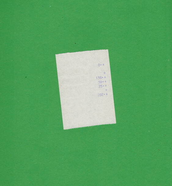 bill or receipt isolated over green background - Photo, Image