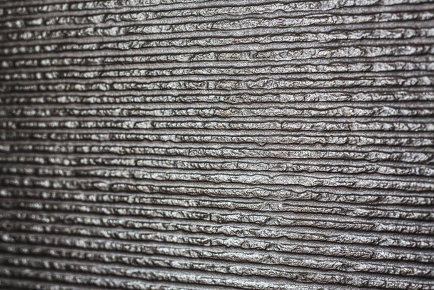 A closeup shot of a grey, textured wall - Photo, Image