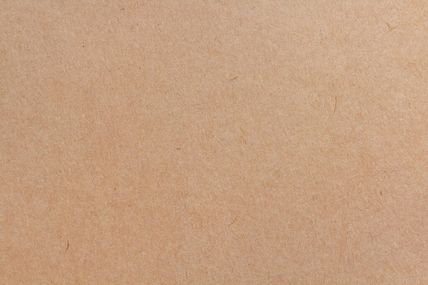 段ボールシートの質感の背景、ヴィンテージスタイルの茶色のクラフト紙のパターン. - 写真・画像