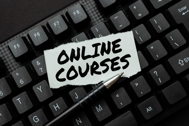 Handwriting text Online Courses. Concept meaning earning an education that is conducted over the Internet Creating New Online Shop Business, Typing List Of Trading Goods - Photo, Image