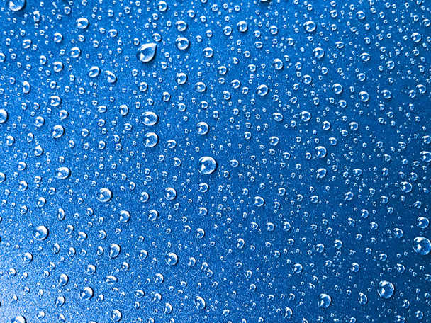 Water drop on blue background - Photo, Image