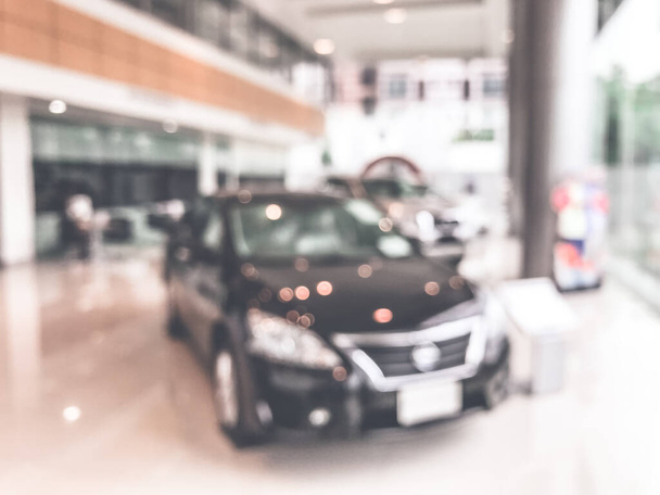 Blur image of car in the showroom use for background - Photo, Image