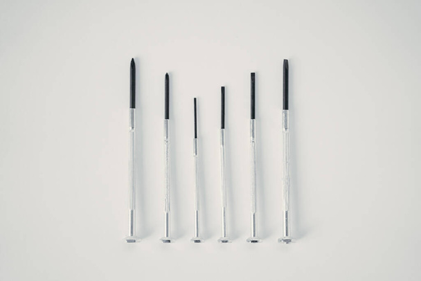 Small watch screwdrivers on isolated white background - Photo, image