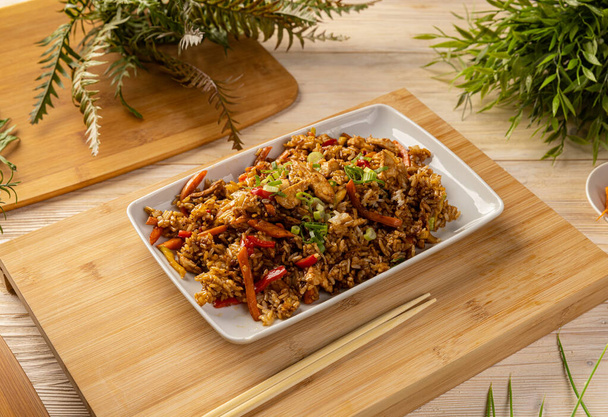 Fried rice with chicken and peppers. Asian style menu - Zdjęcie, obraz