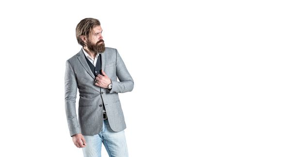 Man in suit. Male beard and mustache. Sexy male, brutal macho, hipster. Hand in with wrist watch in a business suit. Elegant handsome man in suit. Handsome bearded businessman in classic suits - Valokuva, kuva