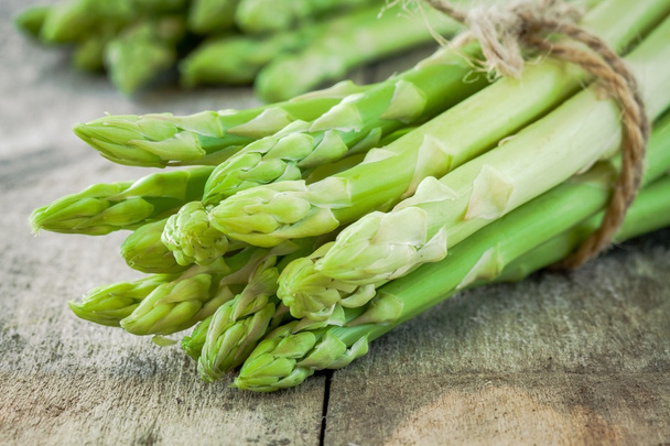 bundle of ripe organic asparagus
 - Фото, изображение
