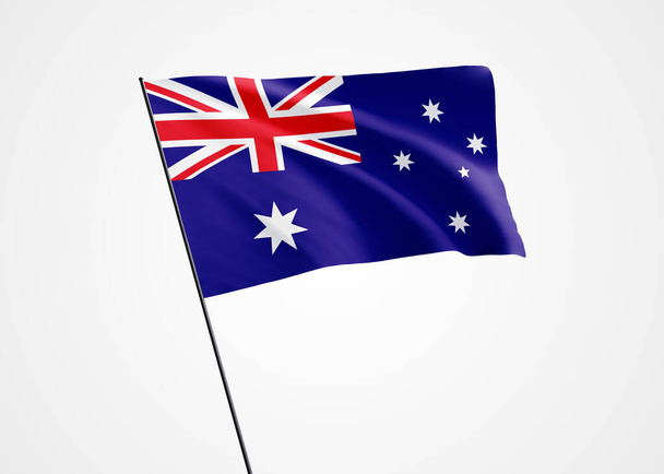 Флаг Австралии развевается высоко на изолированном фоне в день независимости Австралии. Коллекция флагов мира - Фото, изображение