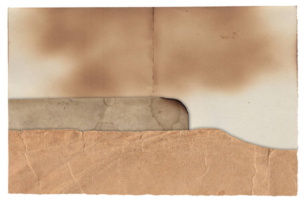Vieux papier vintage texture rugueuse rétro avec des taches brûlées et des rayures fond isolé - Photo, image