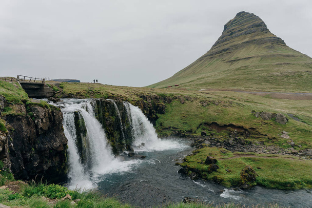 landscape view of Kirkjufellsfoss In the daytime in iceland. High quality photo - Foto, Imagem