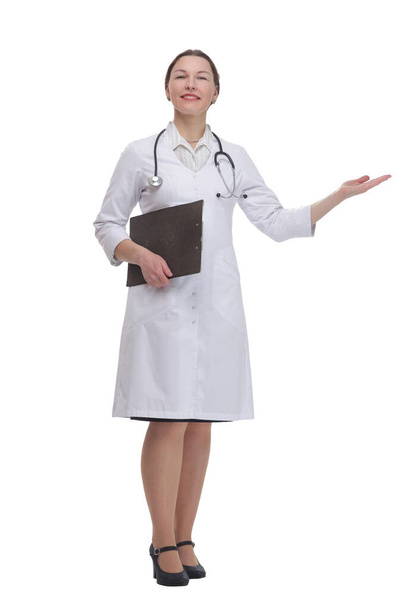 in full growth. female doctor with clipboard. - Фото, зображення