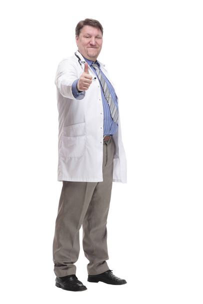 in full growth. friendly doctor in a white coat - 写真・画像