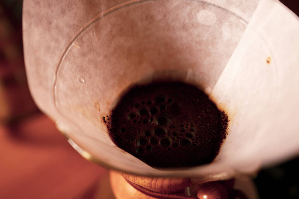 barista brewing coffee in the coffee room - Fotó, kép