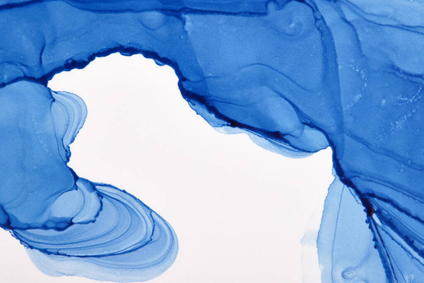 An abstract blurry smeared blue watercolor spot on a white background - Φωτογραφία, εικόνα