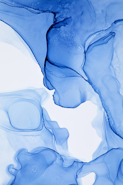 An abstract blurry smeared blue watercolor spot on a white background - Foto, Imagen