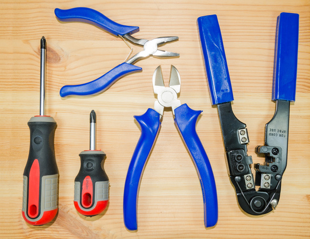 A tongs, pliers, Crimping pliers and two screwdrivers - Foto, immagini