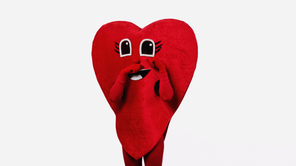 sad person in heart-shaped costume touching cartoon eyes while imitating crying isolated on white - Foto, immagini