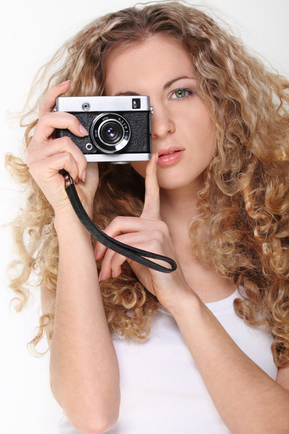 Portrait of the girl with old camera - Photo, image