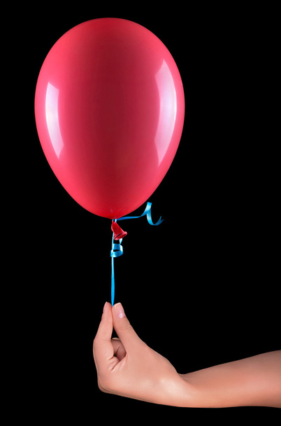 flying balloons with hand isolated - Φωτογραφία, εικόνα
