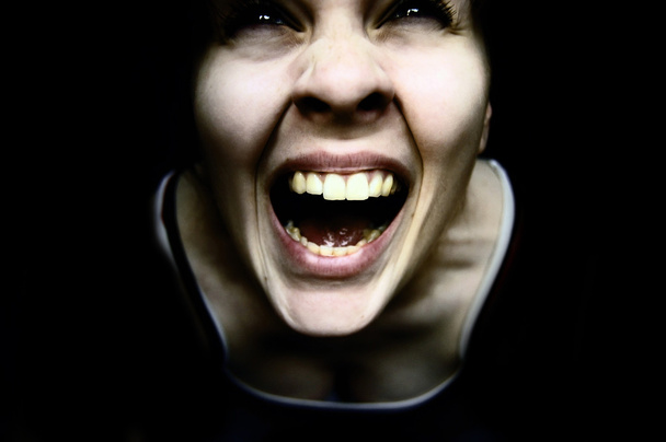 Close up of woman screaming - Photo, Image