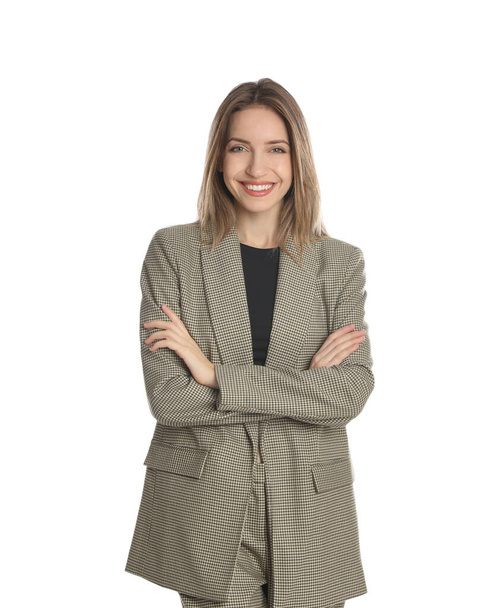 Portrait of beautiful young woman in fashionable suit on white background. Business attire - Valokuva, kuva