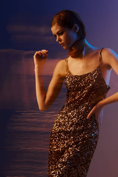 young woman in a shiny dress posing luxury Lifestyle unaltered - Photo, Image